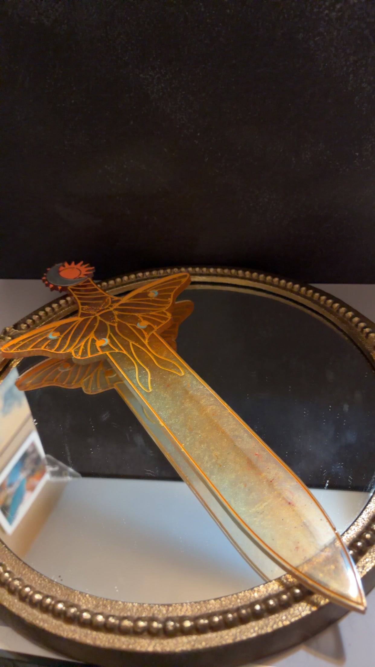 green and orange sword