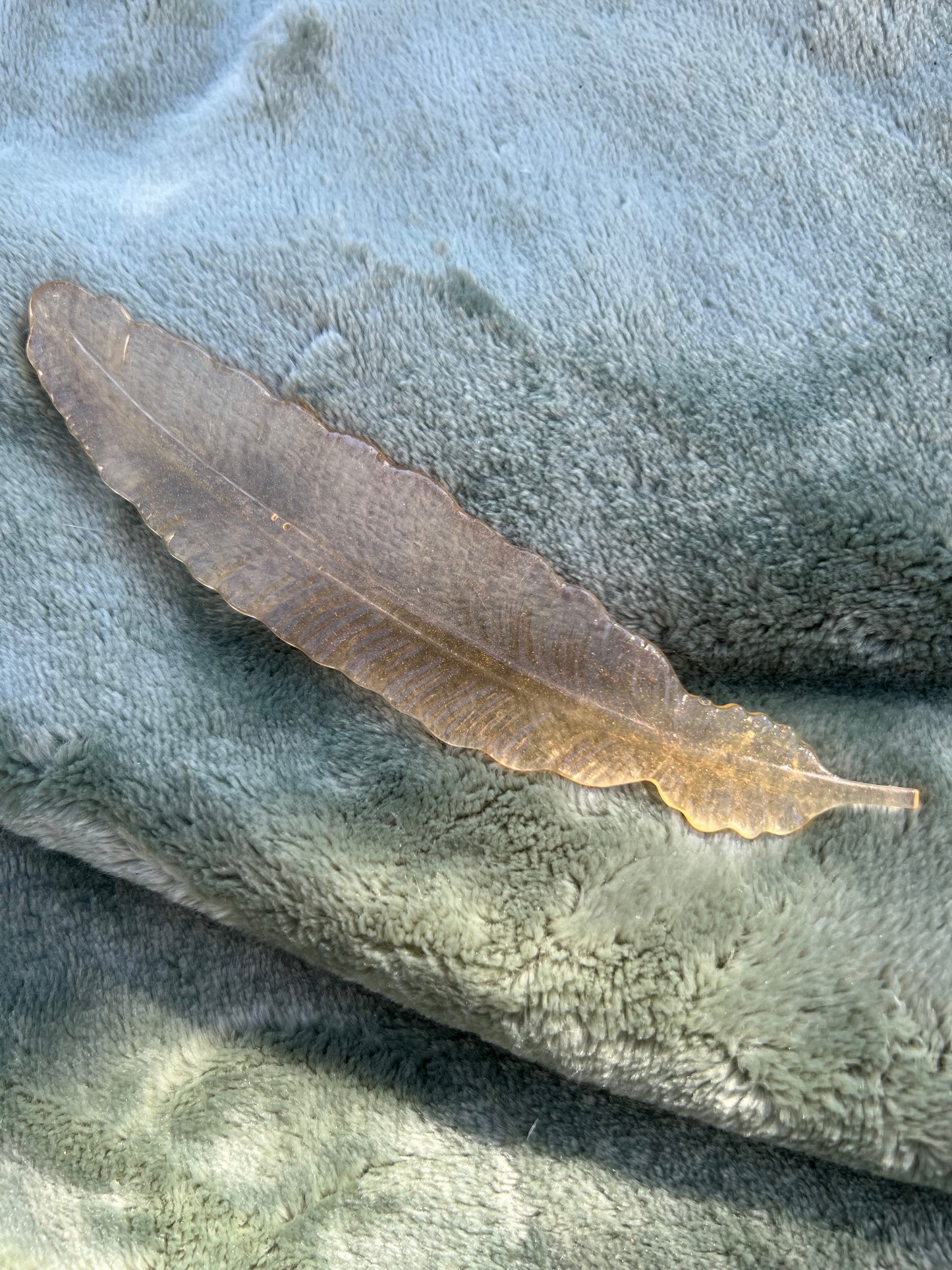 golden orange feather bookmark