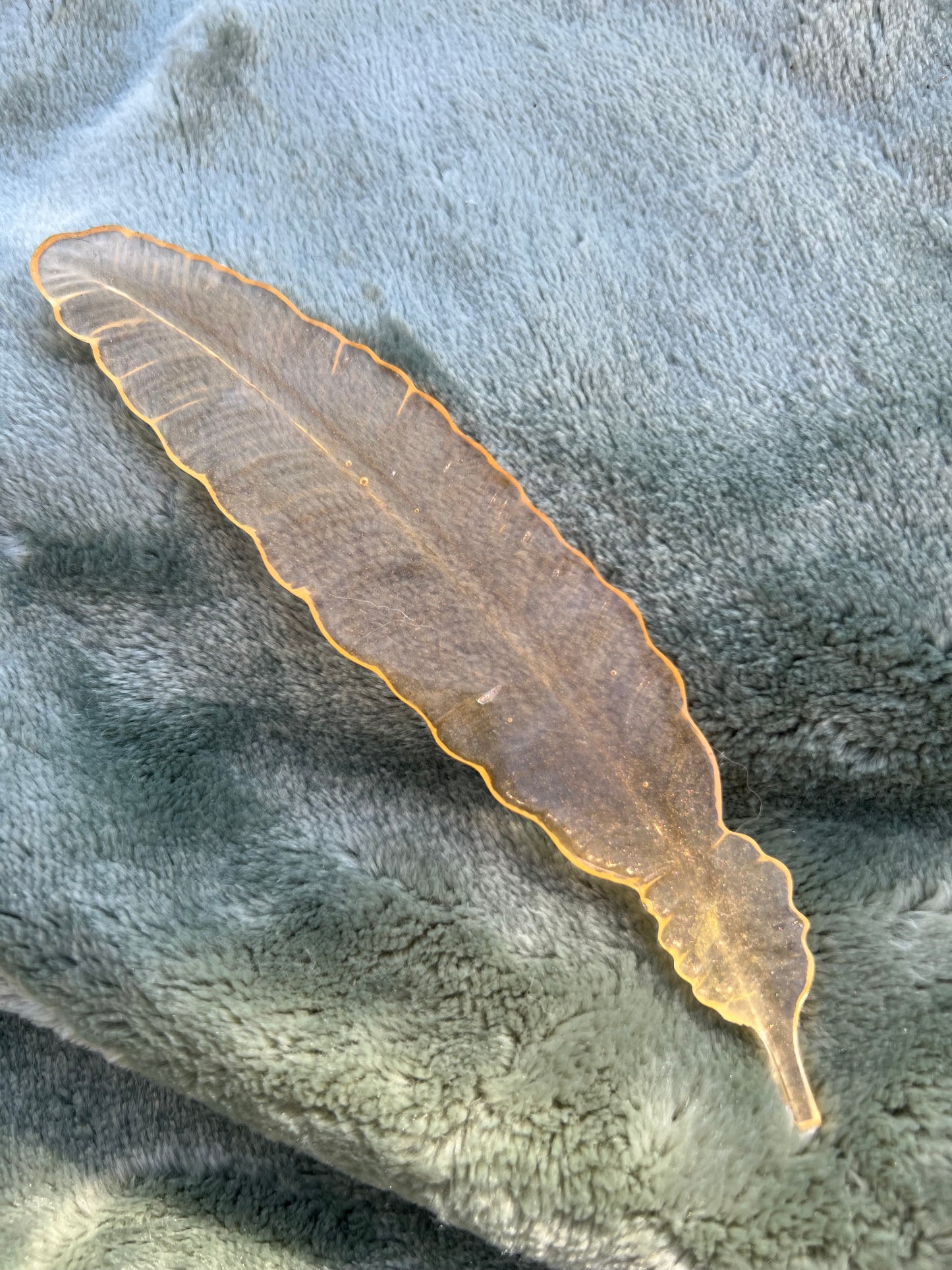 golden orange feather bookmark