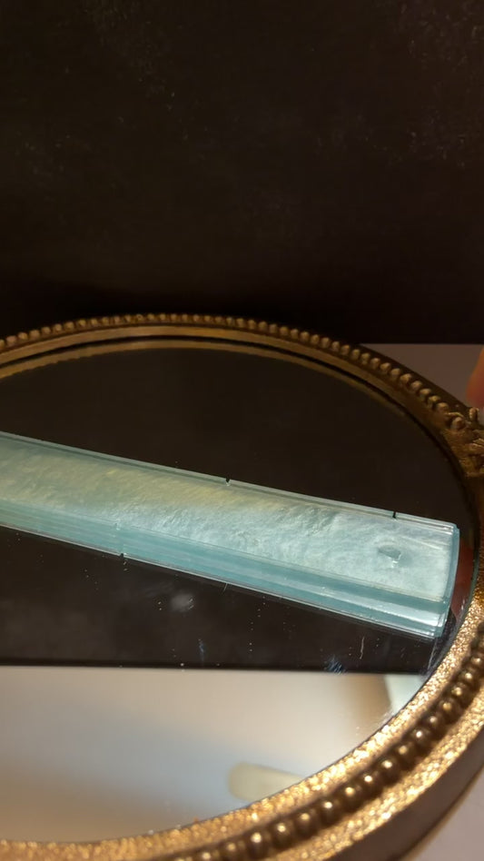 blue and orange incense burner